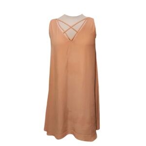 Stylish Peach Sleeveless Dress with Crisscross Detail in Front & Back